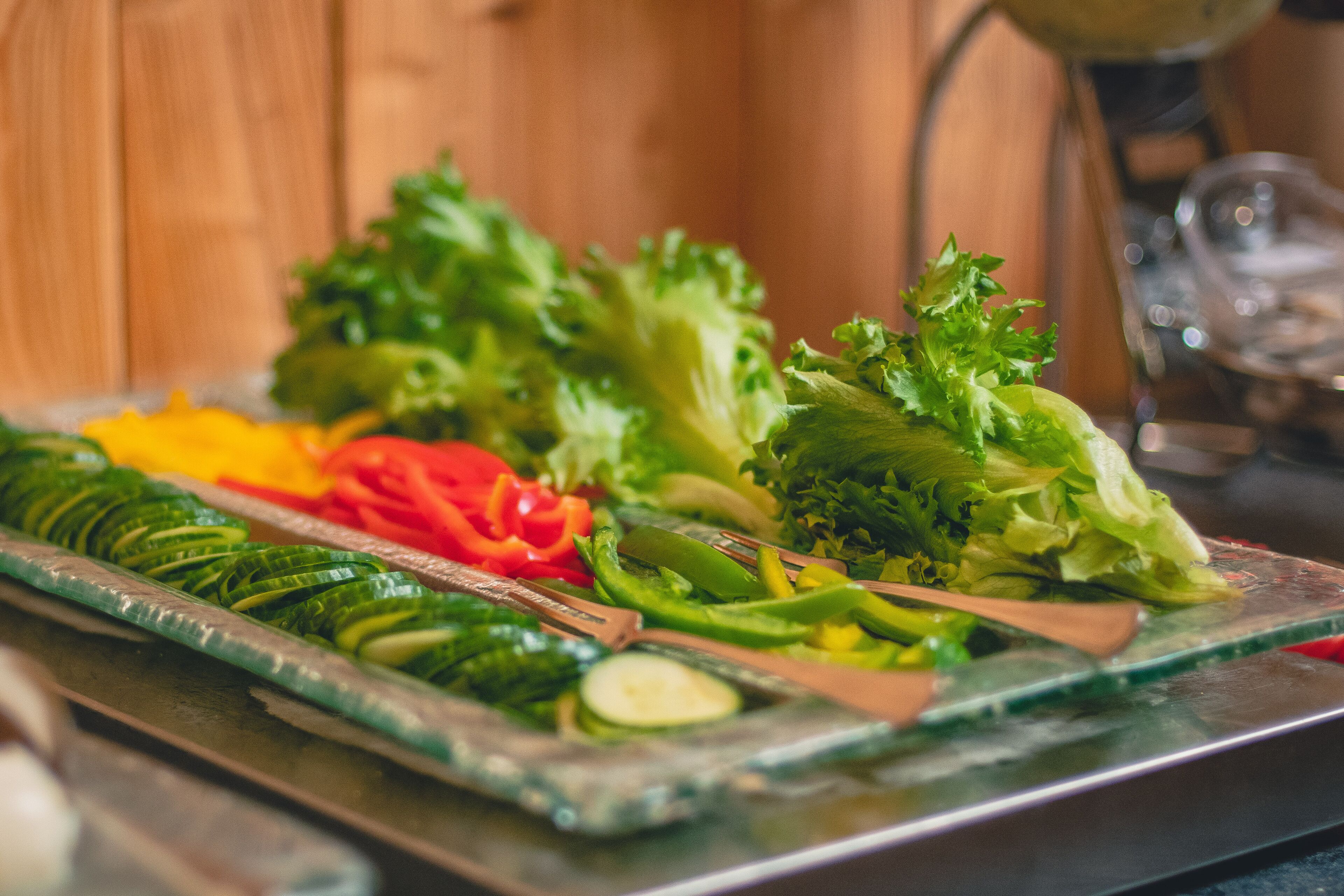 A tray of assorted vegetables on a table.
