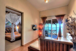 Apartment, Sea View (Feet in Water) | Living area - Hôtel Résidence Au Sable Blanc (Nosy Be)