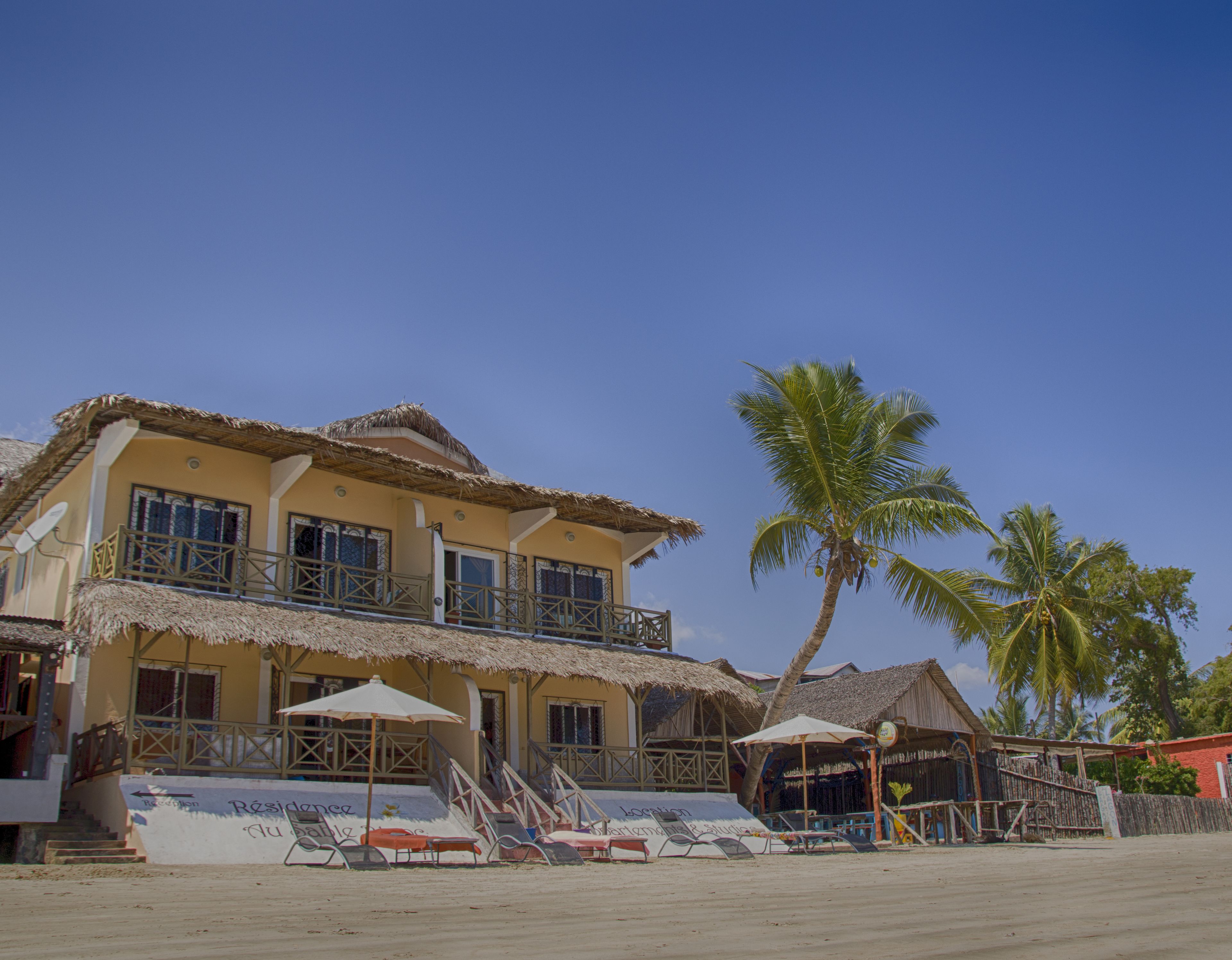 On the beach, sun loungers, fishing