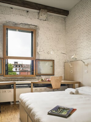 Premium bedding, down comforters, desk, laptop workspace