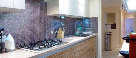 Apartment, 3 Bedrooms | Private kitchen | Full-sized fridge, microwave, oven, stovetop