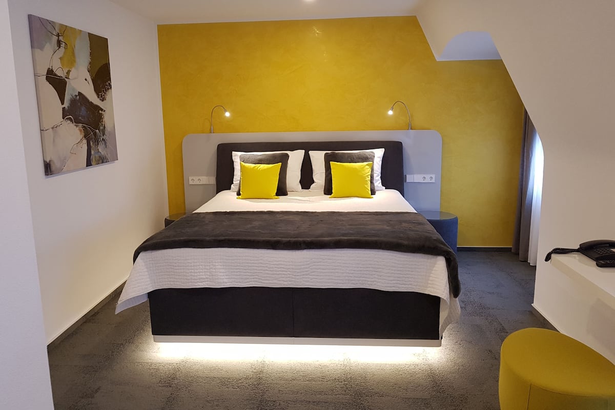 deluxe double room | desk, laptop workspace, blackout curtains, soundproofing