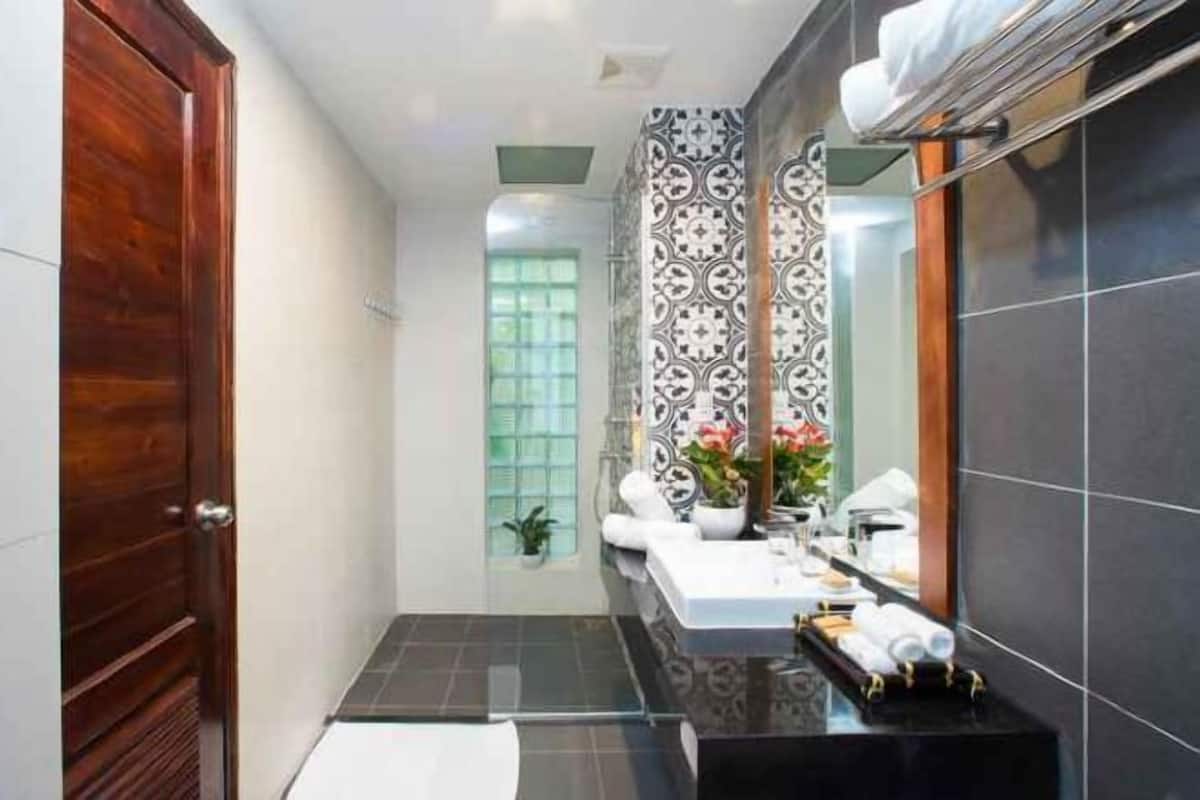 Bathroom | Designer toiletries, hair dryer, bathrobes, slippers