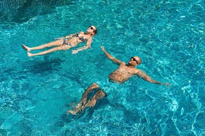 Outdoor pool, an infinity pool, open 6 AM to 10 PM, pool umbrellas - Nadine Phu Quoc Resort & Spa (Phu Quoc)