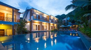 Outdoor pool, an infinity pool, open 6 AM to 10 PM, pool umbrellas - Nadine Phu Quoc Resort & Spa (Phu Quoc)
