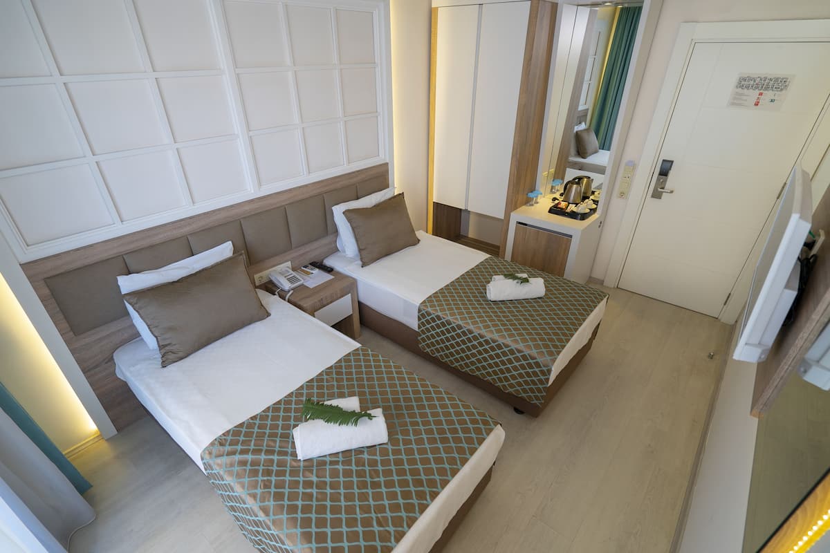 Free minibar items, desk, WiFi, bed sheets