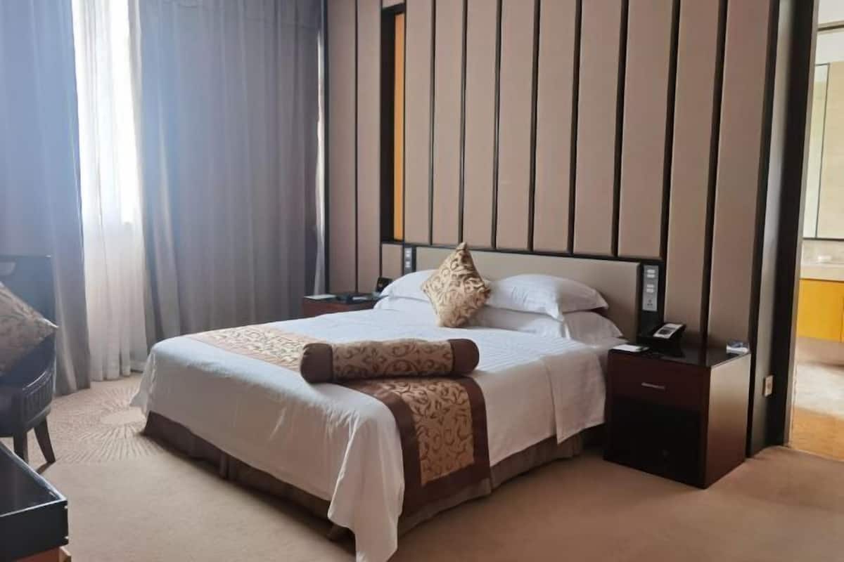 Een minibar, een kluis op de kamer, extra bedden, wifi