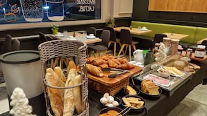 A breakfast buffet with various pastries, bread, and spreads. - Hotel Actuel Chambéry Centre (Chambery)
