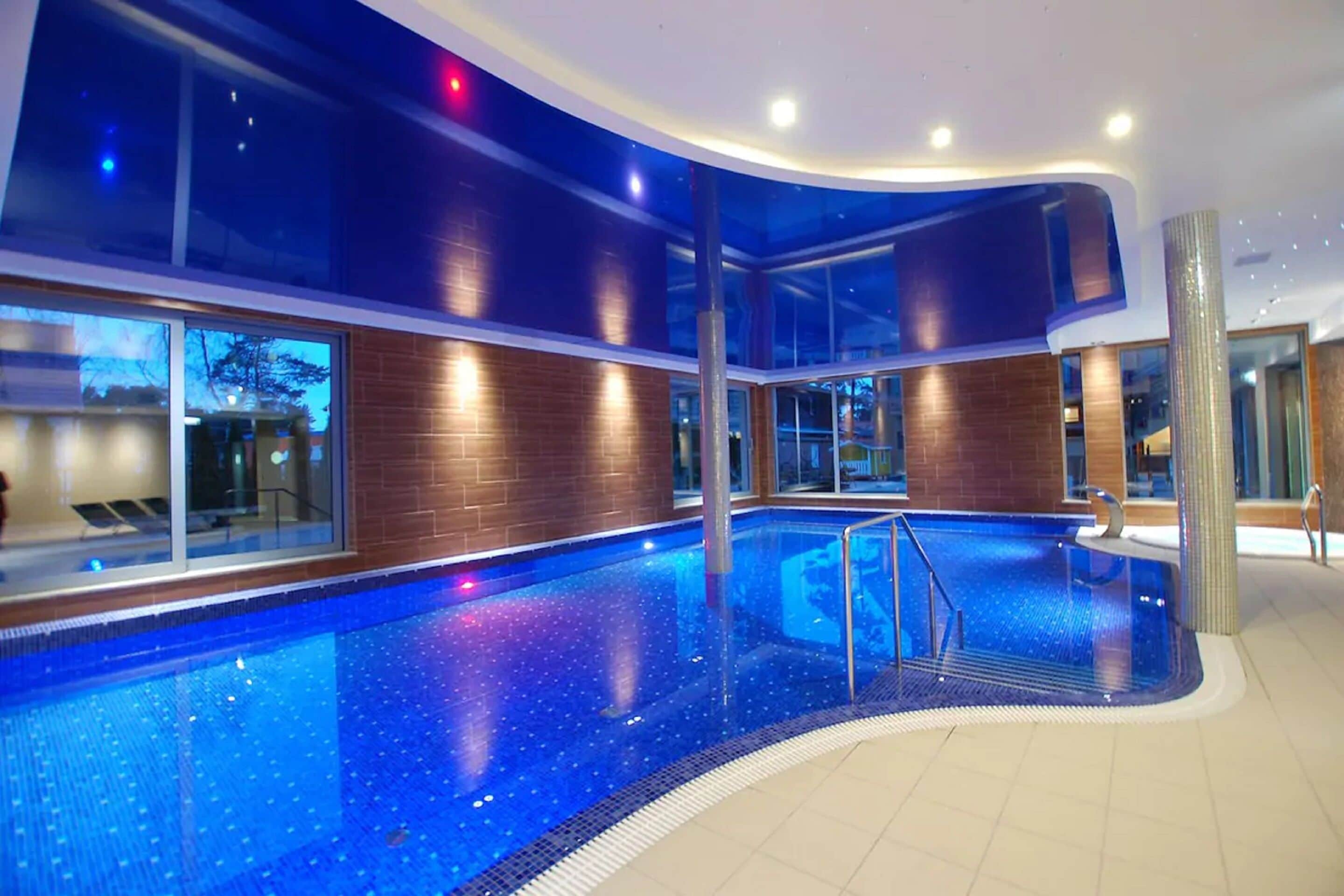 indoor pool, open 8:00 am to 9:00 pm, pool loungers