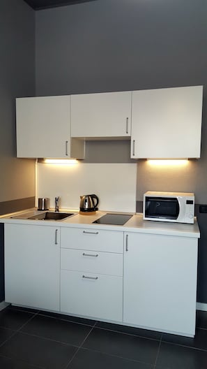 Apartment, 1 Bedroom | Private kitchenette | Full-sized fridge, microwave, stovetop, coffee/tea maker