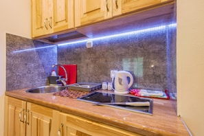 Triple Room (double and single ) | Private kitchenette | Highchair