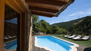 2 outdoor pools, pool umbrellas, pool loungers