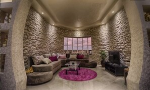 Comfort Villa, 4 Bedrooms | Living area | 50-inch flat-screen TV with satellite channels, TV - Villa Al-Jaouhara (Essaouira)