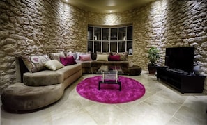 Comfort Villa, 4 Bedrooms | Living area | 50-inch flat-screen TV with satellite channels, TV