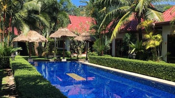 Outdoor pool, pool umbrellas, sun loungers