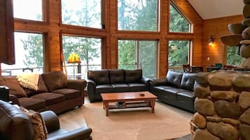 Cabin, 3 Bedrooms | Living area | TV, fireplace, computer monitors