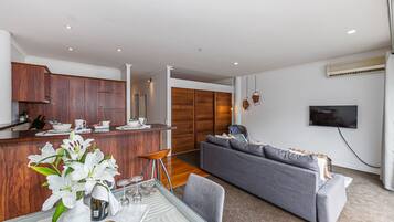 Apartment, 1 Bedroom | Living area | 50-inch flat-screen TV with digital channels, TV, Netflix