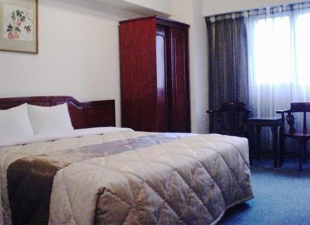 Down duvets, pillow-top beds, desk, blackout curtains