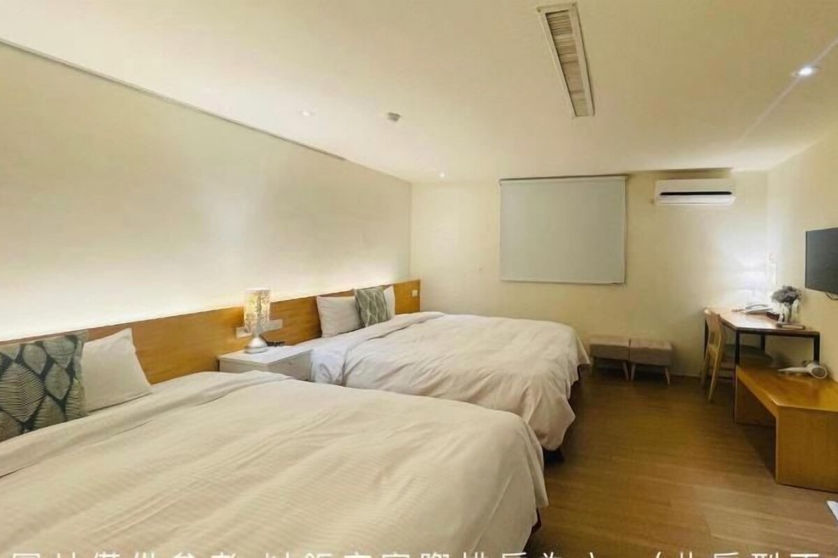 Down comforters, pillowtop beds, desk, blackout drapes