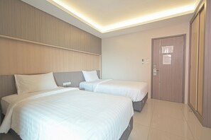 Deluxe Twin kamer | Een bureau, gratis wifi, beddengoed