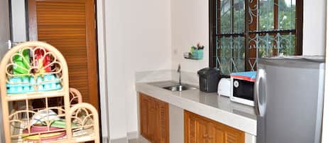 Bungalow, 1 Bedroom, Terrace, Garden Area | Private kitchenette | Full-size fridge, coffee/tea maker, electric kettle, toaster