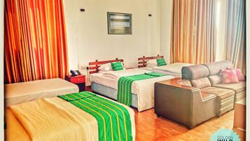 Habitación cuádruple Deluxe, 1 habitación, vista al lago, junto al lago | 1 habitación, edredón, camas Select Comfort y minibar