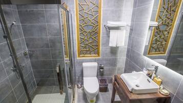 Shower, free toiletries, hair dryer, slippers