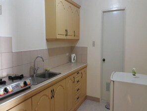 Studio, Kitchenette | Private kitchenette | Electric kettle, dining tables - Sabang Oasis Resort (Puerto Galera)