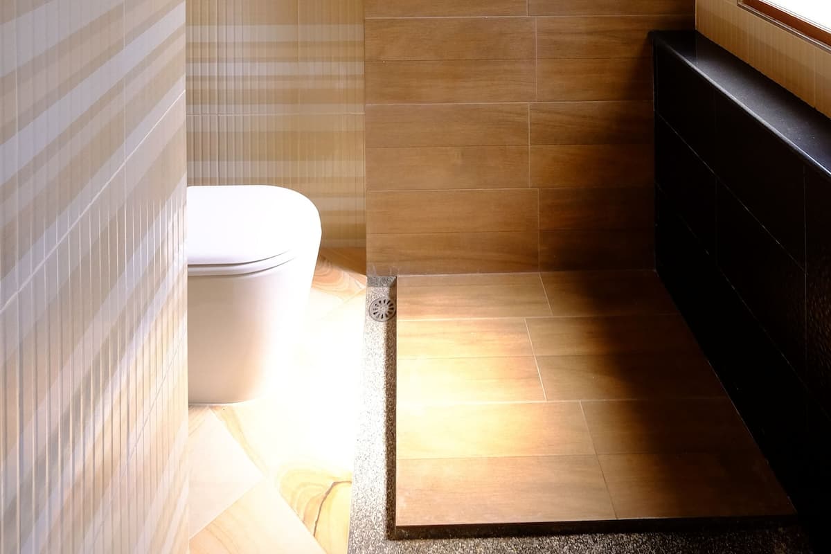 deluxe room  | bathroom | shower, rainfall showerhead, hair dryer, soap