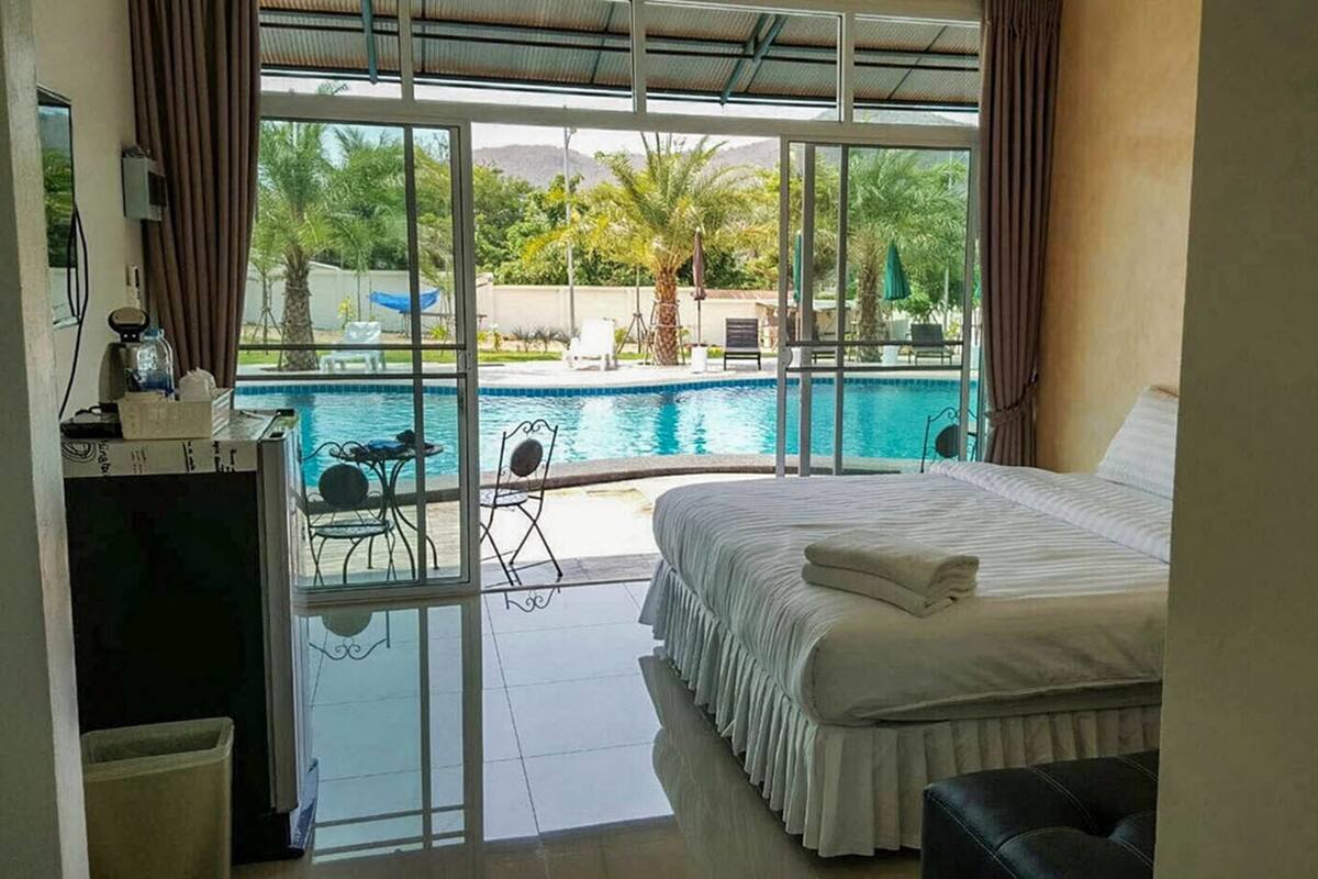 Standard Pool View Room | Desk, blackout drapes, WiFi (free)