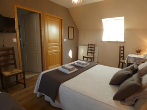 Premium bedding, desk, laptop workspace, soundproofing