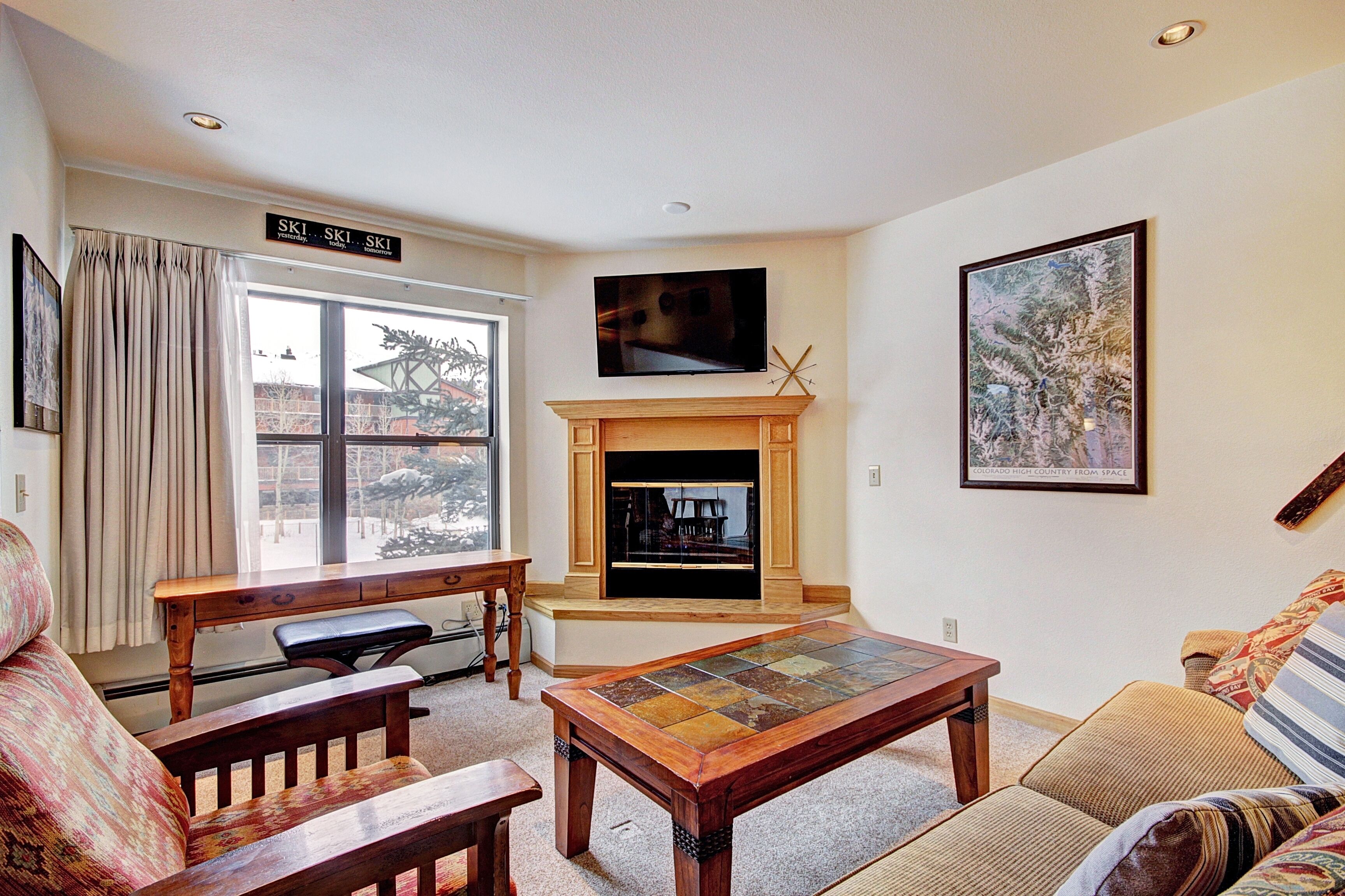 Condo, 1 Bedroom | Living area | Flat-screen TV, fireplace, DVD player