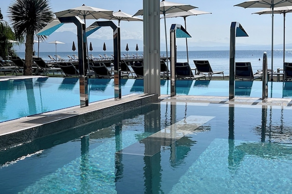 Indoor pool, outdoor pool, pool umbrellas, sun loungers