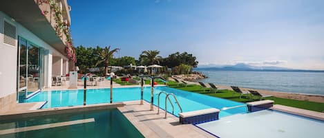 Indoor pool, 2 outdoor pools, pool umbrellas, pool loungers