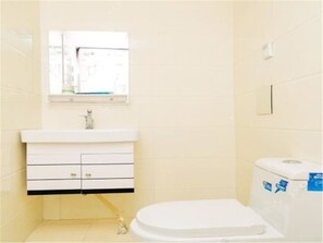 Shower, free toiletries, hair dryer, slippers