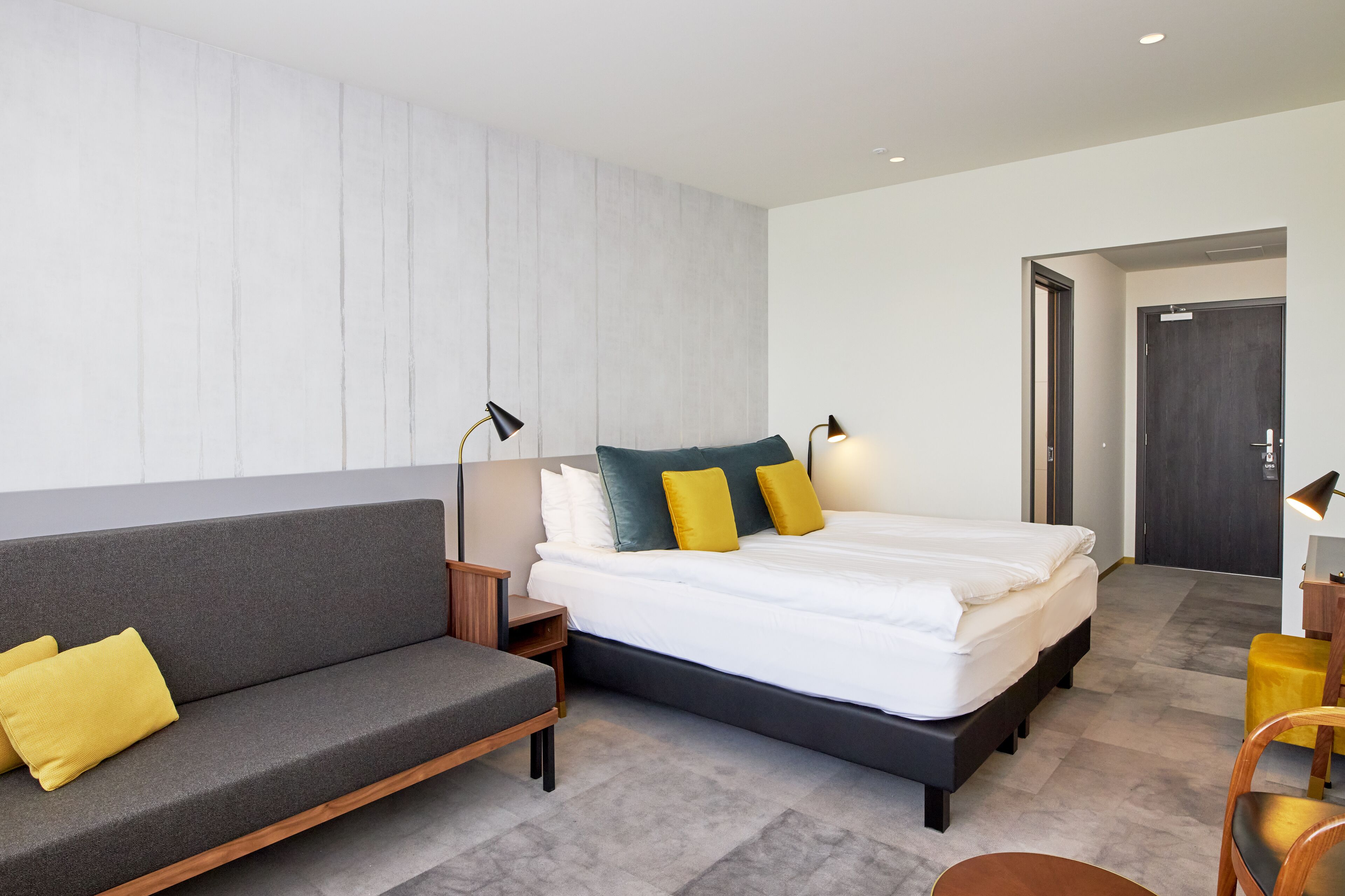 family room | 1 bedroom, desk, blackout curtains, iron/ironing board