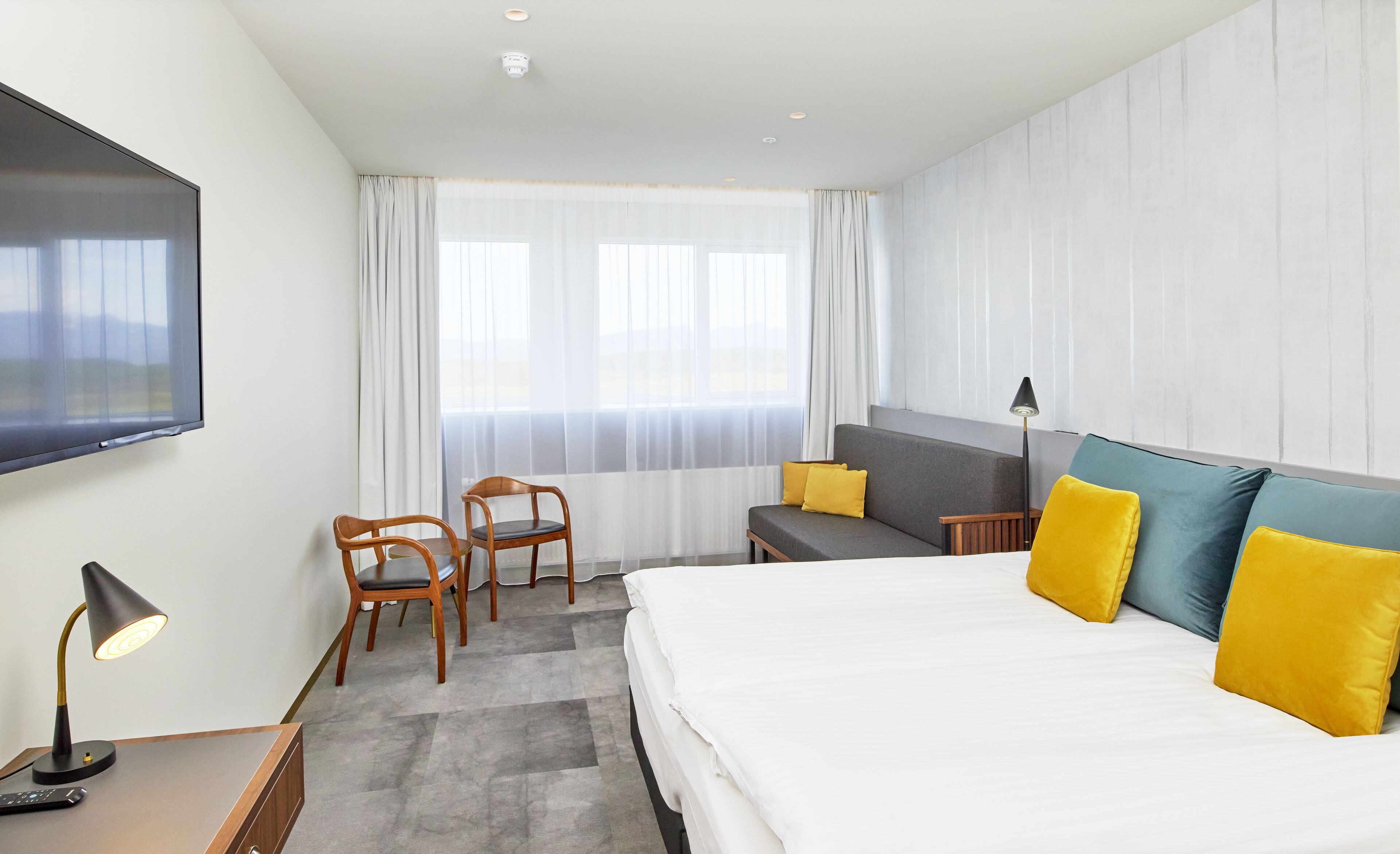 family room | 1 bedroom, desk, blackout curtains, iron/ironing board