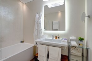 Shower, rainfall showerhead, designer toiletries, hair dryer