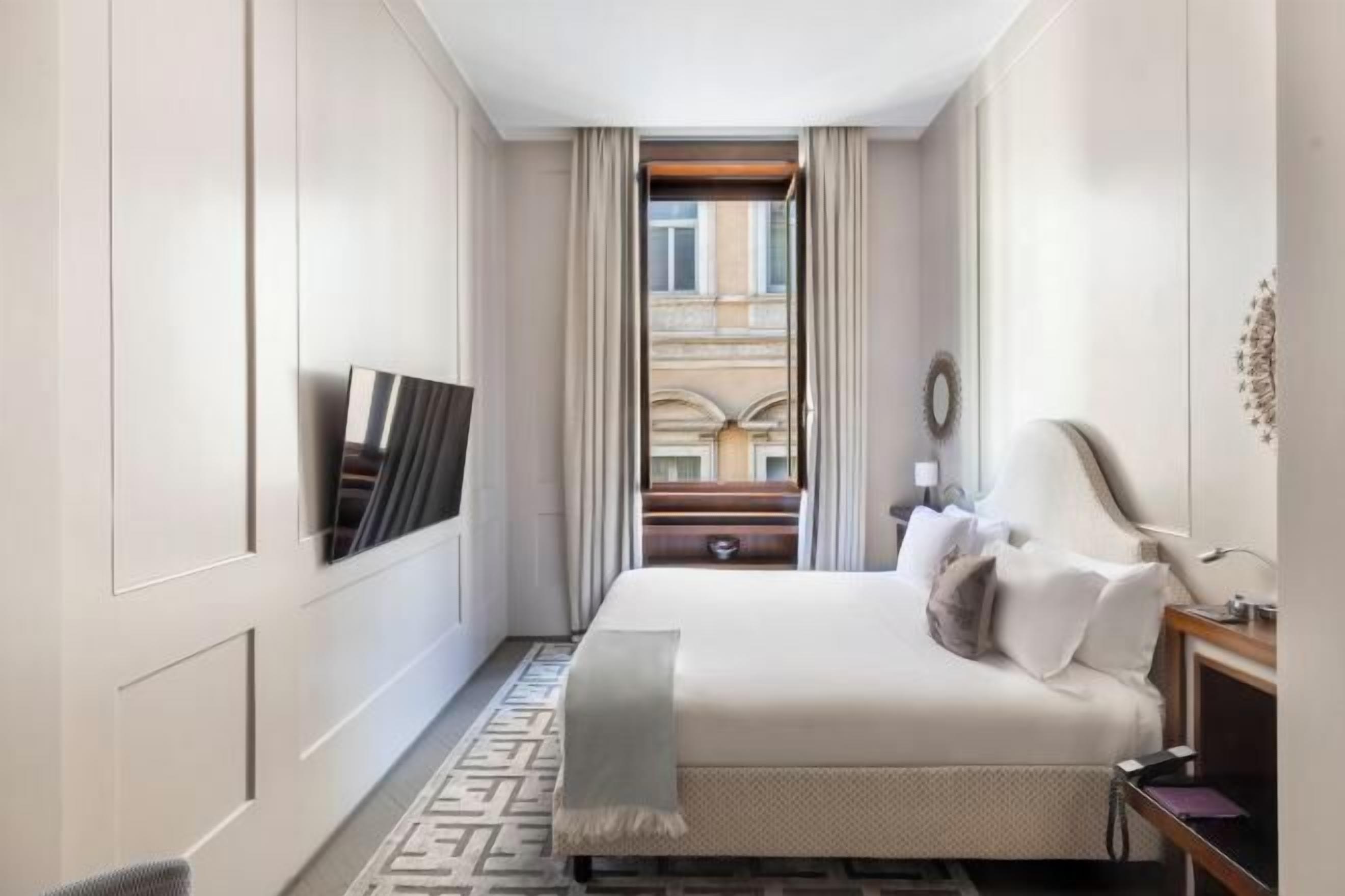 Egyptian cotton sheets, premium bedding, down comforters, minibar