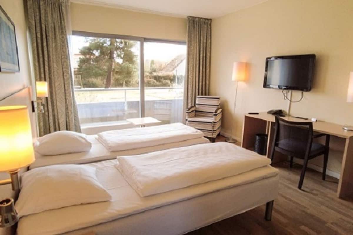1 chambre, rideaux occultants, Wi-Fi gratuit, draps fournis