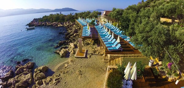 Private beach, sun-loungers, beach umbrellas, beach bar