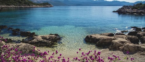 Private beach, sun-loungers, beach umbrellas, beach bar