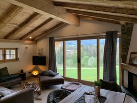 Premium Chalet | Living area | 40-inch flat-screen TV with satellite channels, TV, Netflix