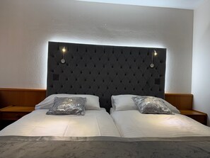 Chambre Simple Supérieure | Literie de qualité supérieure, minibar, coffres-forts dans les chambres