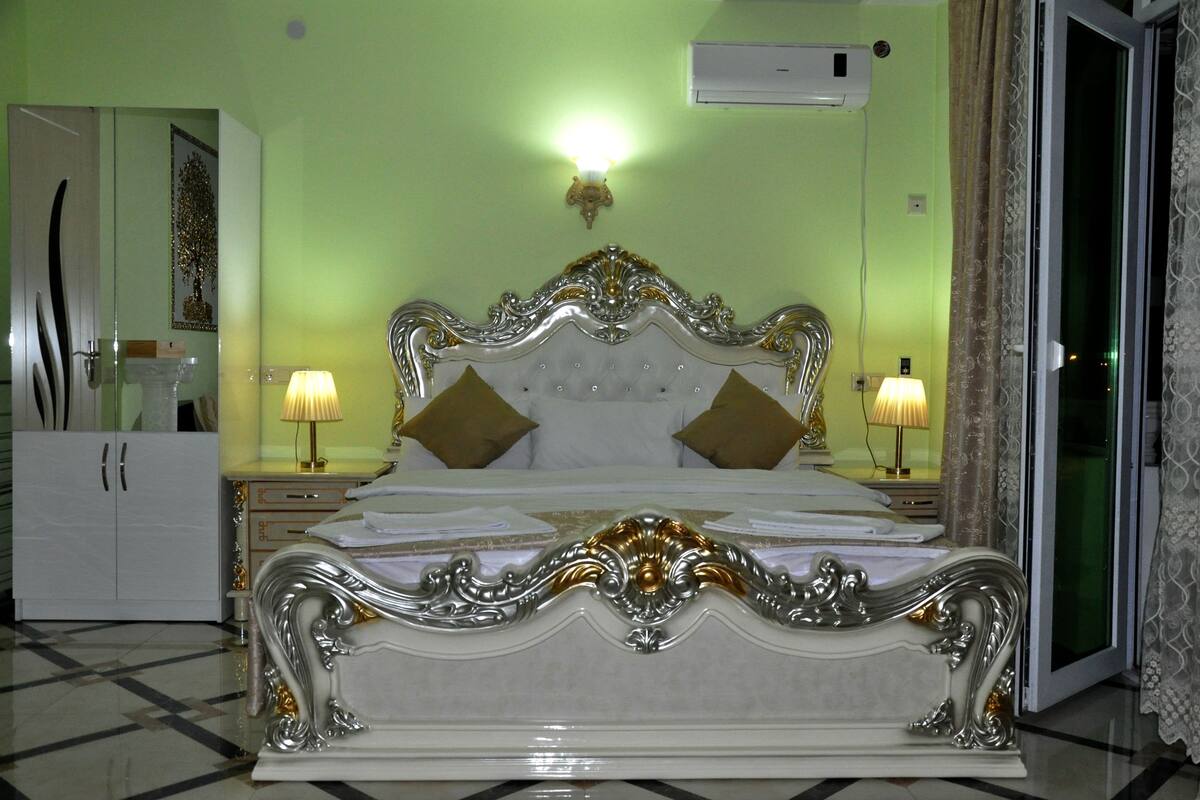 Deluxe Double Room | Minibar, in-room safe, desk, iron/ironing board (on request)