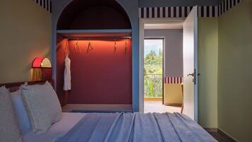 Deluxe Apartment, 2 Bedrooms, Pool View | Premium bedding, minibar, in-room safe, iron/ironing board