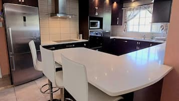 Fridge, microwave, coffee/tea maker, electric kettle