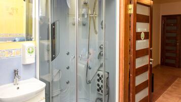 Shower, hair dryer, towels, soap