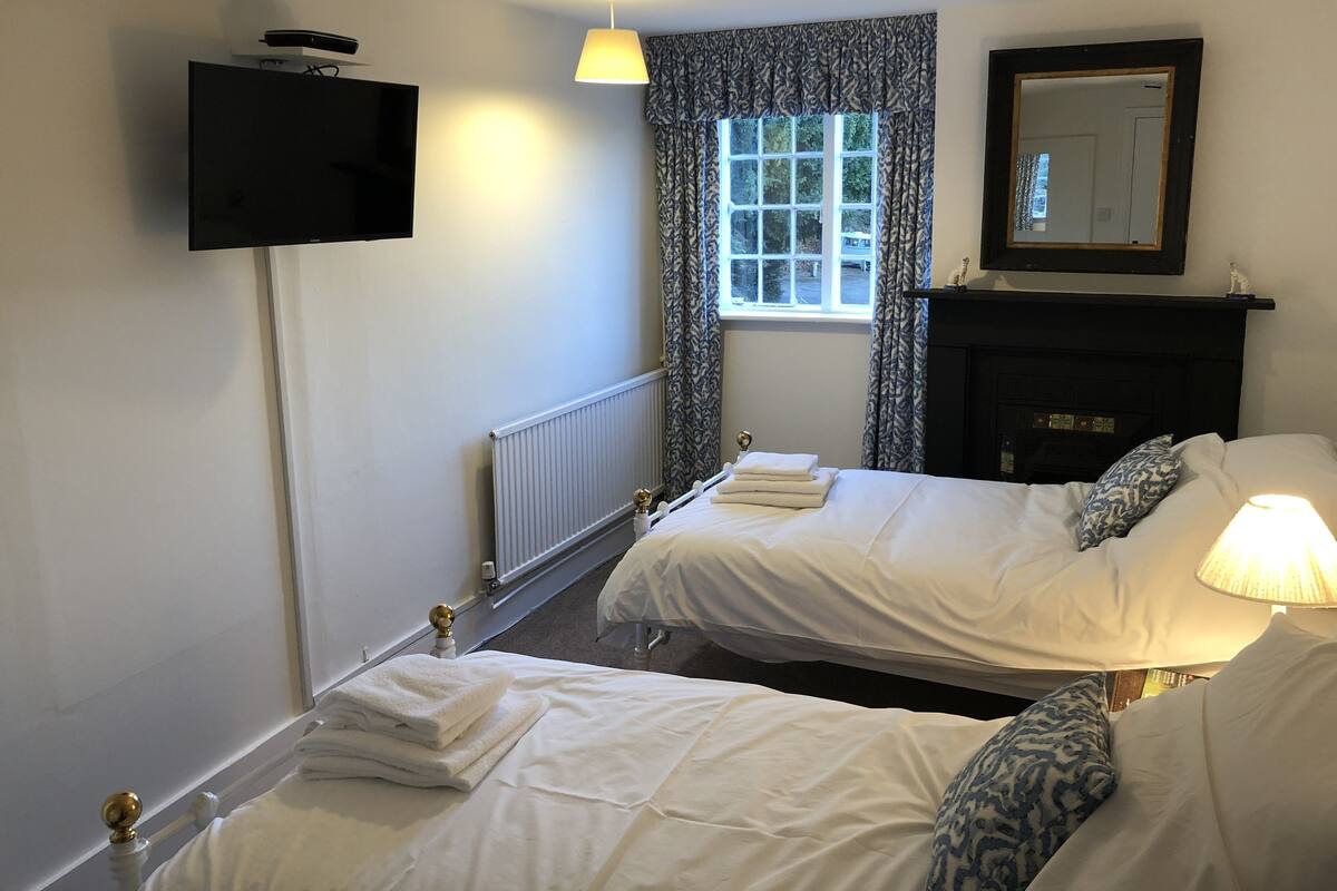 Blackout curtains, iron/ironing board, free WiFi, bed sheets