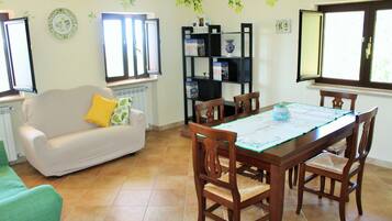 Apartment, 2 Bedrooms | Living area | TV